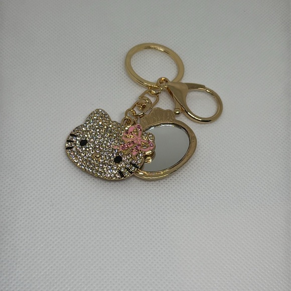 Gold and Pink Hello Kitty Keychain with a mini mirror - Picture 2 of 3